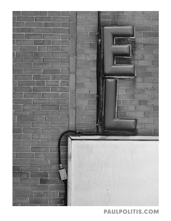 Hotel Sign Detail (black and white photograph)